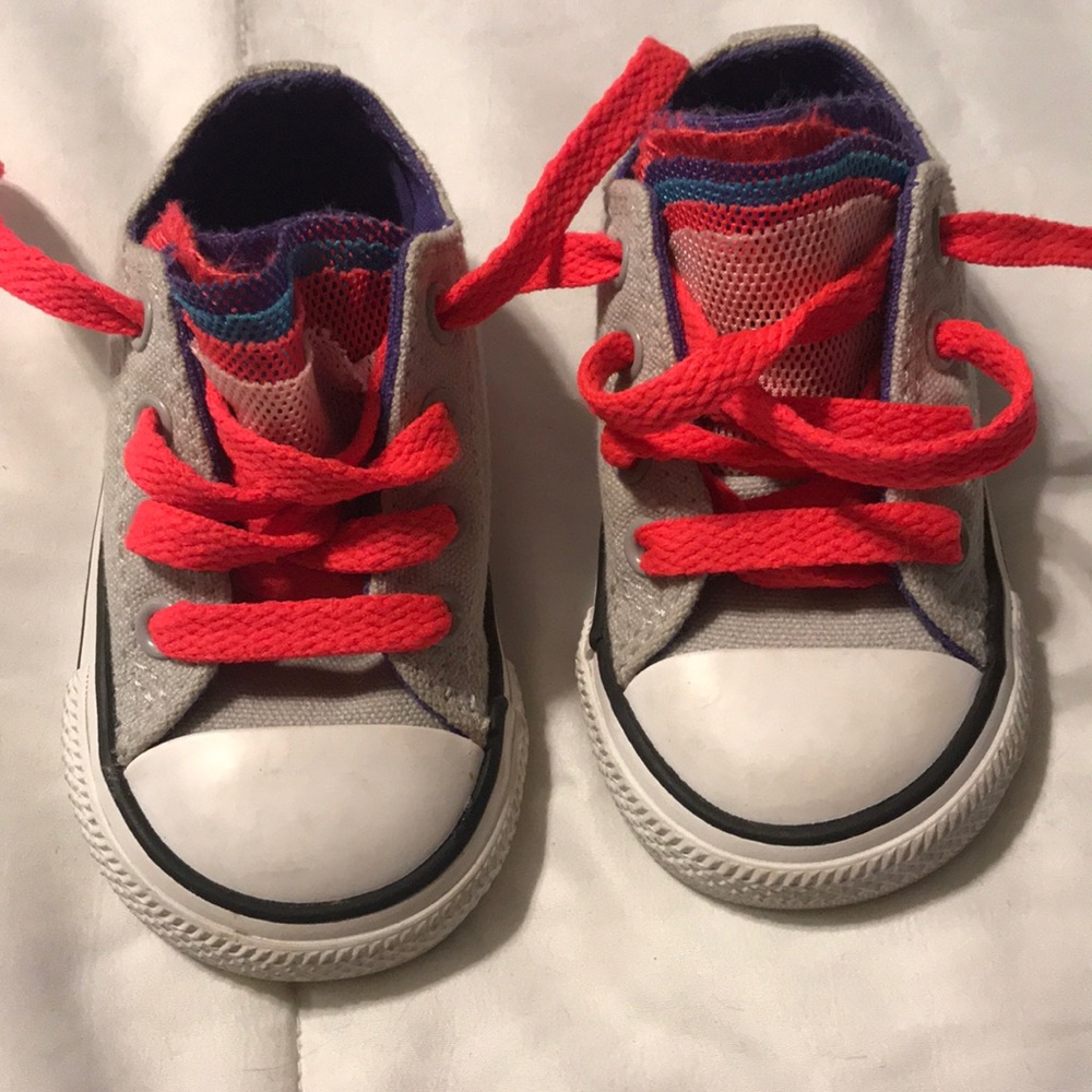 Gray Chucks with multi color tongue
